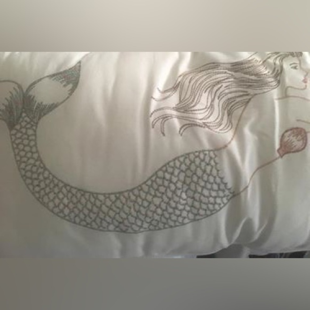 Long mermaid embroidered pillow. White/off white/cream colored. No rips/stains